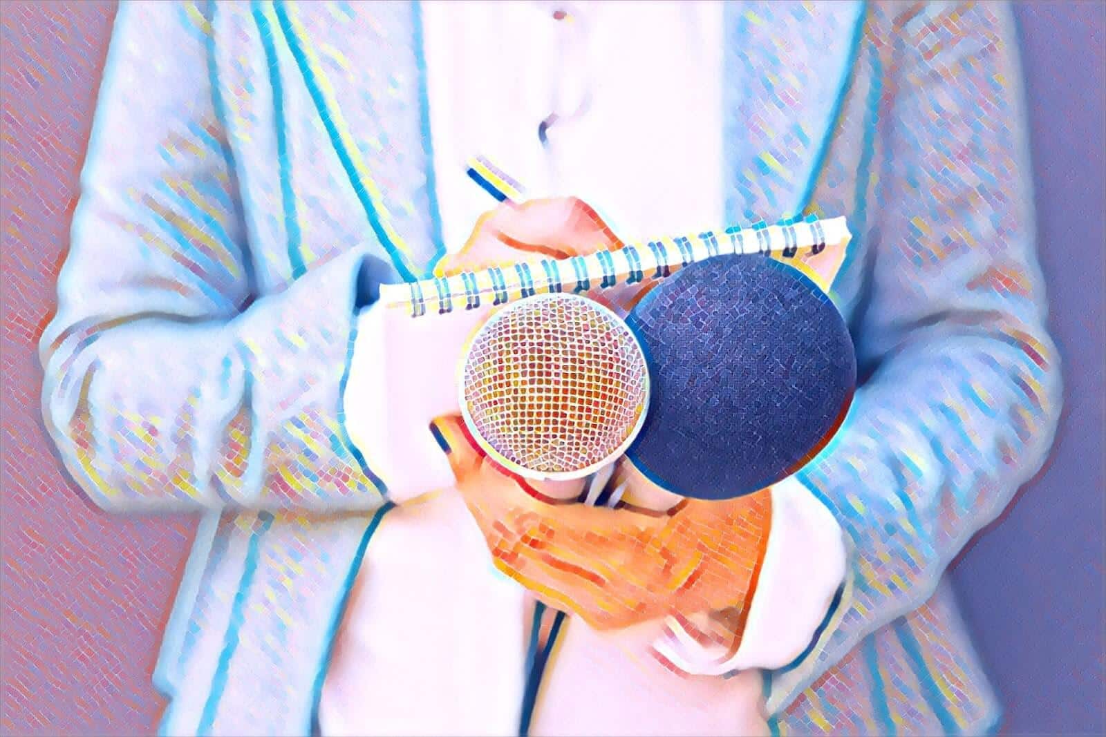 Reporter holding notebook and microphone